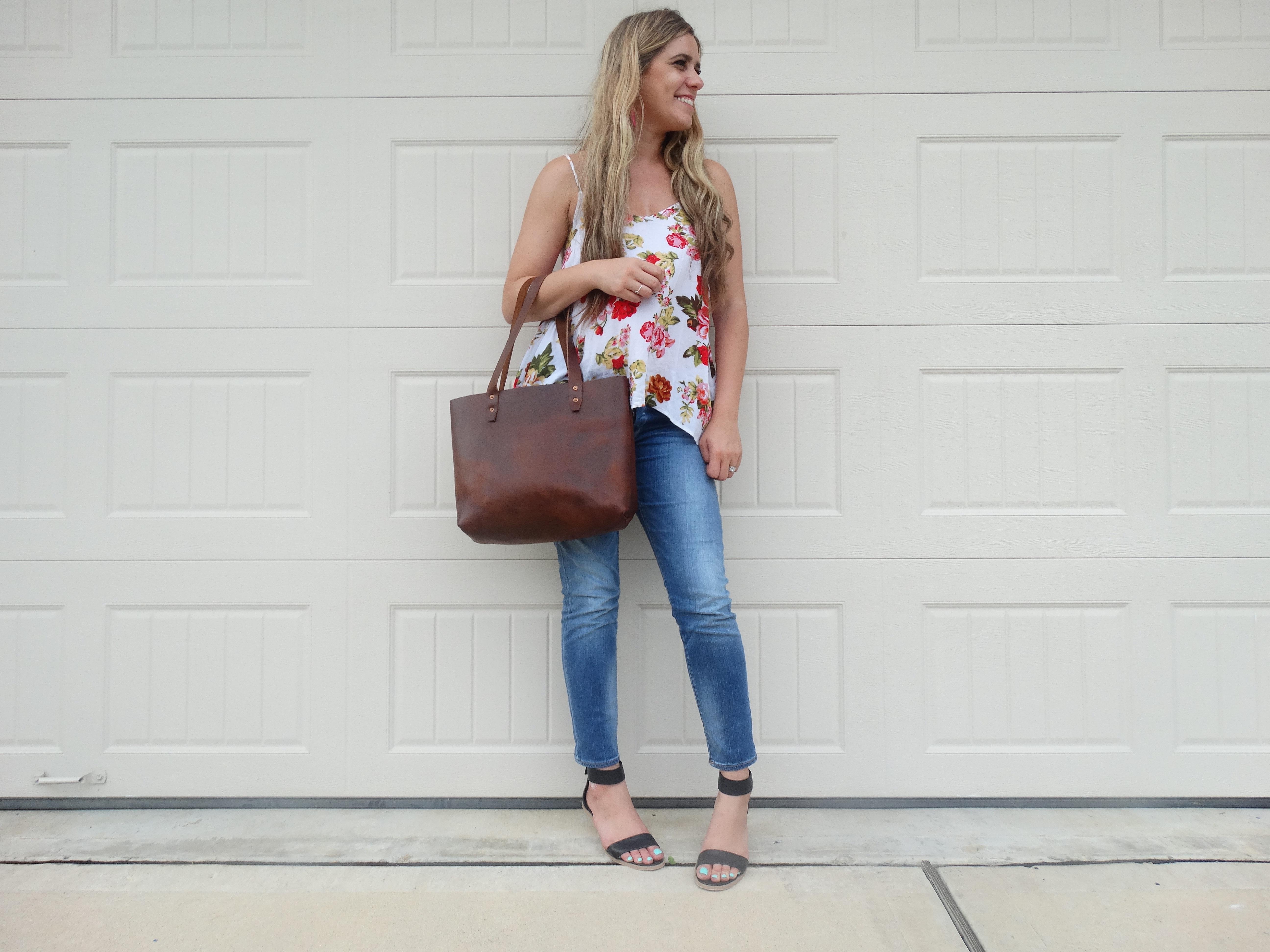 Floral, skinny jeans, wedges, leather bag